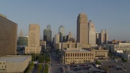5.7K aerial stock footage flyby city hall and neighboring skyscraper at sunrise, Downtown Kansas City, Missouri Aerial Stock Footage | DX0001_001222