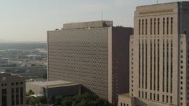 5.7K aerial stock footage of approaching a government office building at sunrise, Downtown Kansas City, Missouri Aerial Stock Footage | DX0001_001250