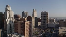 5.7K aerial stock footage of a group of city skyscrapers at sunrise, Downtown Kansas City, Missouri Aerial Stock Footage | DX0001_001274