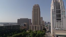 5.7K aerial stock footage stationary view, flyby city hall near a tall skyscraper in Downtown Kansas City, Missouri Aerial Stock Footage | DX0001_001287