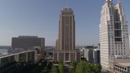 5.7K aerial stock footage stationary view of city hall near a tall skyscraper in Downtown Kansas City, Missouri Aerial Stock Footage | DX0001_001288