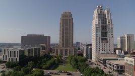 5.7K aerial stock footage slow approach to city hall near a tall skyscraper in Downtown Kansas City, Missouri Aerial Stock Footage | DX0001_001289