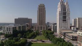 5.7K aerial stock footage of flying over park to approach city hall in Downtown Kansas City, Missouri Aerial Stock Footage | DX0001_001297