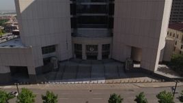 5.7K aerial stock footage of a reverse view of federal courthouse entrance in Downtown Kansas City, Missouri Aerial Stock Footage | DX0001_001304