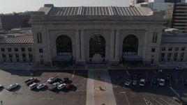 5.7K aerial stock footage reverse view of historic train station, reveal fountain in Kansas City, Missouri Aerial Stock Footage | DX0001_001312