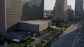 5.7K aerial stock footage stationary and reverse view of entrance to a government office building in Downtown Kansas City, Missouri Aerial Stock Footage | DX0001_001327