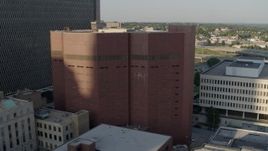 5.7K aerial stock footage of a reverse view of a city prison in Downtown Kansas City, Missouri Aerial Stock Footage | DX0001_001339