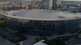 5.7K aerial stock footage of a close orbit of an arena at sunset in Downtown Kansas City, Missouri Aerial Stock Footage | DX0001_001344
