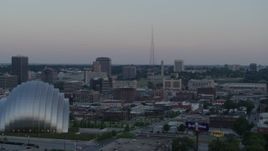 5.7K aerial stock footage of radio tower, fly past the convention center and concert hall at sunset in Downtown Kansas City, Missouri Aerial Stock Footage | DX0001_001359