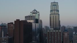 5.7K aerial stock footage flyby tall city skyscrapers at sunset in Downtown Kansas City, Missouri Aerial Stock Footage | DX0001_001362