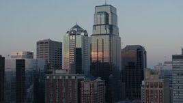 5.7K aerial stock footage ascend and orbit tall city skyscrapers at sunset in Downtown Kansas City, Missouri Aerial Stock Footage | DX0001_001363