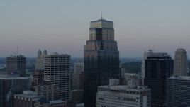 5.7K aerial stock footage descend and orbit tall city skyscrapers at sunset in Downtown Kansas City, Missouri Aerial Stock Footage | DX0001_001364