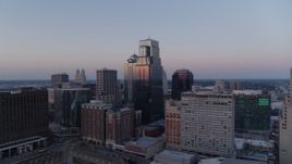 5.7K aerial stock footage flyby skyscrapers at twilight in Downtown Kansas City, Missouri Aerial Stock Footage | DX0001_001373