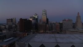 5.7K aerial stock footage of downtown hotel and skyscrapers at twilight in Downtown Kansas City, Missouri Aerial Stock Footage | DX0001_001388