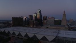 5.7K aerial stock footage pass and approach downtown hotel and skyscrapers at twilight in Downtown Kansas City, Missouri Aerial Stock Footage | DX0001_001389
