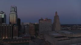 5.7K aerial stock footage of a downtown hotel and skyscrapers at twilight in Downtown Kansas City, Missouri Aerial Stock Footage | DX0001_001390