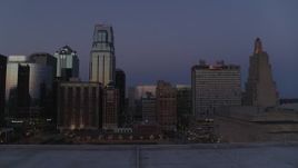 5.7K aerial stock footage ascend with a view of a hotel and skyscrapers at twilight in Downtown Kansas City, Missouri Aerial Stock Footage | DX0001_001393