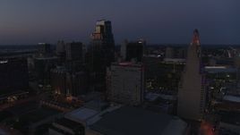 5.7K aerial stock footage flyby and descend with view of hotel and skyscrapers at twilight in Downtown Kansas City, Missouri Aerial Stock Footage | DX0001_001398