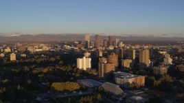 5.7K aerial stock footage of downtown skyscrapers seen from apartment complexes at sunrise, Downtown Denver, Colorado Aerial Stock Footage | DX0001_001403