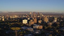 5.7K aerial stock footage of downtown skyscrapers seen from apartment complexes at sunrise, Downtown Denver, Colorado Aerial Stock Footage | DX0001_001405