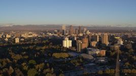 5.7K aerial stock footage of downtown skyscrapers and apartment complexes at sunrise, Downtown Denver, Colorado Aerial Stock Footage | DX0001_001406