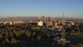 5.7K aerial stock footage of skyscrapers, apartment buildings, and radio tower at sunrise, Downtown Denver, Colorado Aerial Stock Footage | DX0001_001407