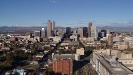 5.7K aerial stock footage of flying away from skyscrapers in Downtown Denver, Colorado Aerial Stock Footage | DX0001_001433