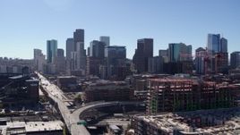5.7K aerial stock footage ascend near construction site for view of skyline in Downtown Denver, Colorado Aerial Stock Footage | DX0001_001472
