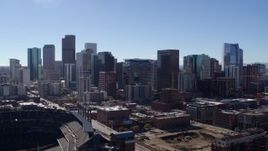 5.7K aerial stock footage of slowly flying by the city's skyline in Downtown Denver, Colorado Aerial Stock Footage | DX0001_001494