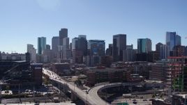 5.7K aerial stock footage of the city's skyline seen during slow descent in Downtown Denver, Colorado Aerial Stock Footage | DX0001_001495