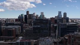 5.7K aerial stock footage of office buildings and the city's skyline in Downtown Denver, Colorado Aerial Stock Footage | DX0001_001498