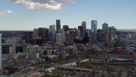 5.7K aerial stock footage flyby the city's skyline, reveal a residential skyscraper in Downtown Denver, Colorado Aerial Stock Footage | DX0001_001514
