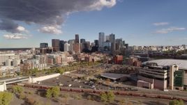 5.7K aerial stock footage flyby the city skyline in the distance, reveal the arena, Downtown Denver, Colorado Aerial Stock Footage | DX0001_001538