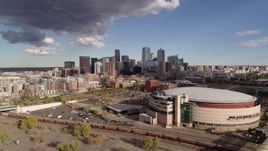 5.7K aerial stock footage stationary view of arena, and the city skyline in the distance, Downtown Denver, Colorado Aerial Stock Footage | DX0001_001539