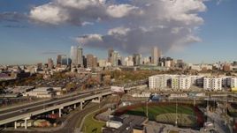 5.7K aerial stock footage of the city skyline seen from W Colfax Avenue, Downtown Denver, Colorado Aerial Stock Footage | DX0001_001543