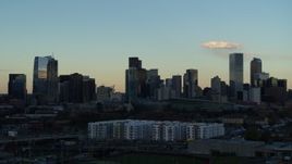 5.7K aerial stock footage slowly flyby tall skyscrapers in the city skyline at sunset, Downtown Denver, Colorado Aerial Stock Footage | DX0001_001554