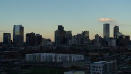 5.7K aerial stock footage of the tall skyscrapers in the city skyline at sunset, Downtown Denver, Colorado Aerial Stock Footage | DX0001_001556