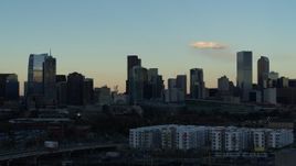 5.7K aerial stock footage of the towering skyscrapers in the city skyline at sunset, Downtown Denver, Colorado Aerial Stock Footage | DX0001_001557