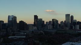 5.7K aerial stock footage ascend and flyby the towering skyscrapers in the city skyline at sunset, Downtown Denver, Colorado Aerial Stock Footage | DX0001_001558