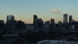 5.7K aerial stock footage slowly flyby the towering skyscrapers in the city skyline at sunset, Downtown Denver, Colorado Aerial Stock Footage | DX0001_001559