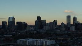 5.7K aerial stock footage stationary view of towering skyscrapers in the city skyline at sunset, Downtown Denver, Colorado Aerial Stock Footage | DX0001_001560