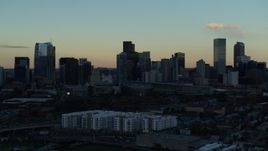 5.7K aerial stock footage stationary view of the city's skyscrapers in the skyline at sunset, Downtown Denver, Colorado Aerial Stock Footage | DX0001_001562