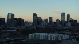 5.7K aerial stock footage of a slow pass of the city's skyline at sunset, Downtown Denver, Colorado Aerial Stock Footage | DX0001_001566