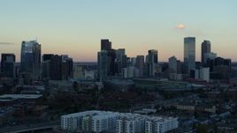 5.7K aerial stock footage of a slow approach to the city's skyline at sunset, Downtown Denver, Colorado Aerial Stock Footage | DX0001_001569