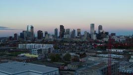 5.7K aerial stock footage of flyby the city's downtown skyline at sunset, Downtown Denver, Colorado Aerial Stock Footage | DX0001_001574