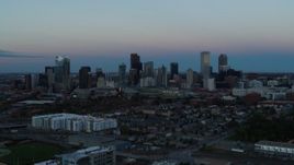 5.7K aerial stock footage descend with view of the city's downtown skyline at sunset, Downtown Denver, Colorado Aerial Stock Footage | DX0001_001584