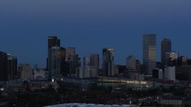 5.7K aerial stock footage of passing by the city's downtown skyscrapers and convention center at twilight, Downtown Denver, Colorado Aerial Stock Footage | DX0001_001590