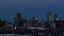 5.7K aerial stock footage of the city's downtown skyscrapers by the convention center at twilight, Downtown Denver, Colorado Aerial Stock Footage | DX0001_001592