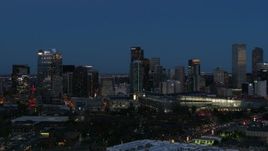 5.7K aerial stock footage flyby the city's skyscrapers and convention center at twilight, Downtown Denver, Colorado Aerial Stock Footage | DX0001_001596