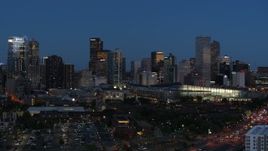5.7K aerial stock footage descend and flyby the city's skyscrapers and convention center at twilight, Downtown Denver, Colorado Aerial Stock Footage | DX0001_001600
